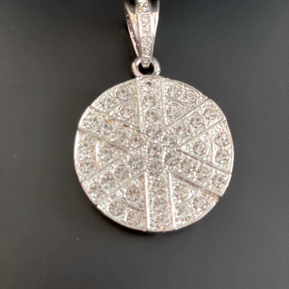 Beautiful cubic zirconia medallion.